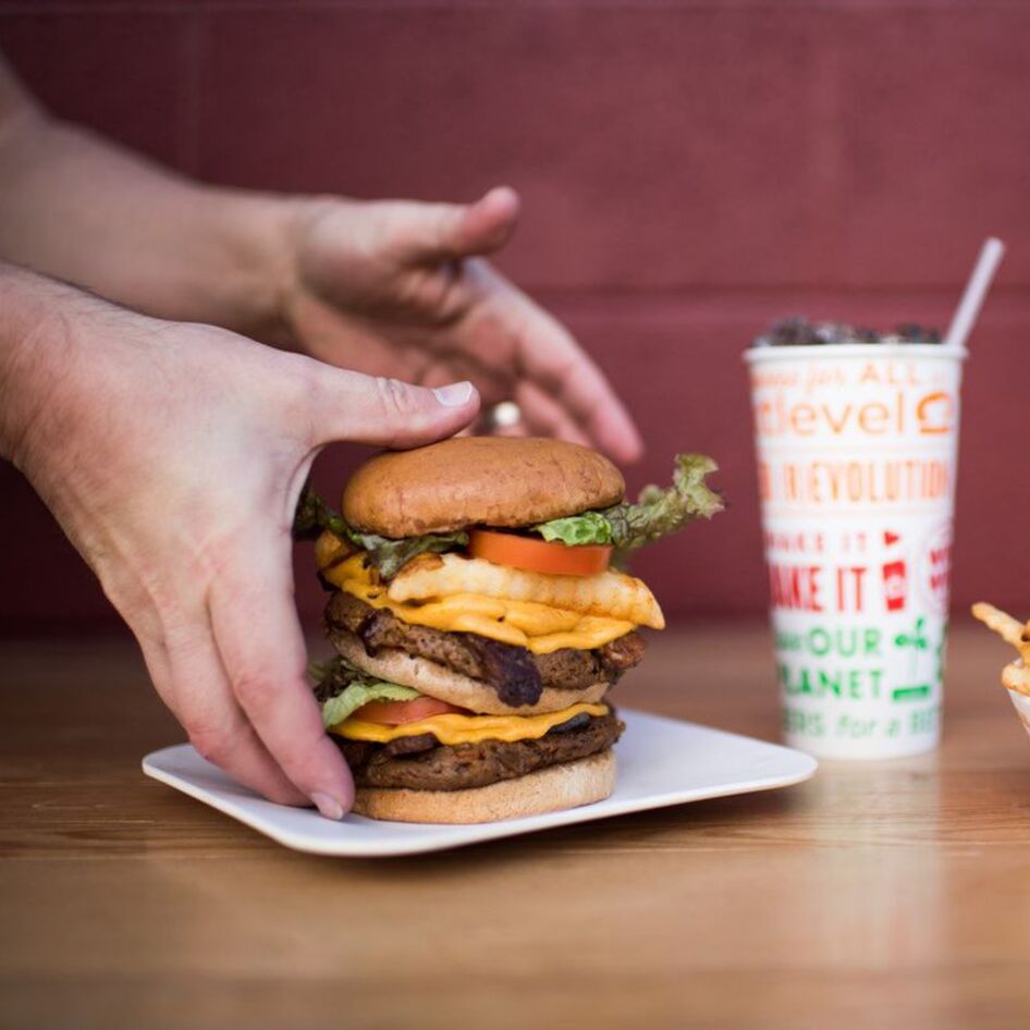 Next Level Burger Acquires Veggie Grill to Form Largest Vegan Burger Chain: “We’re Just Getting Started”