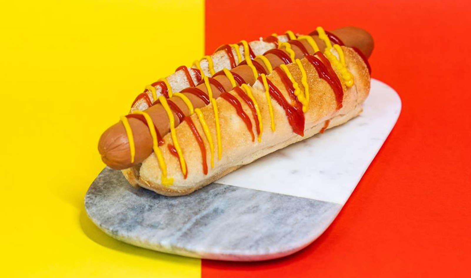 UK’s Top “Bleeding” Burger Brand Debuts Vegan “Foot-Long” Hot Dog