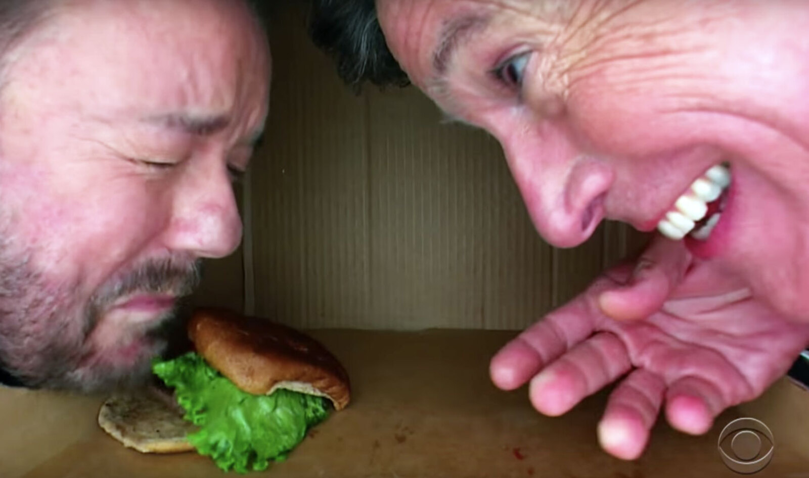 Watch Stephen Colbert Throw a Vegan Burger at Ricky Gervais Inside a Box