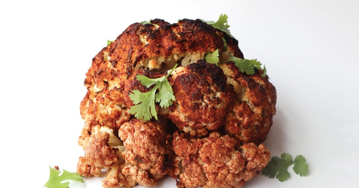 Whole Roasted Jamaican Jerk Cauliflower | VegNews