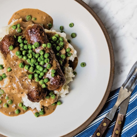 Meaty Vegan Bangers and Mash With Herbed Gravy