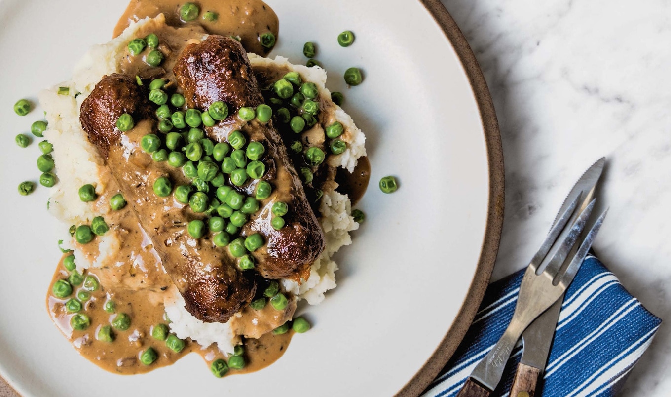 Meaty Vegan Bangers and Mash With Herbed Gravy