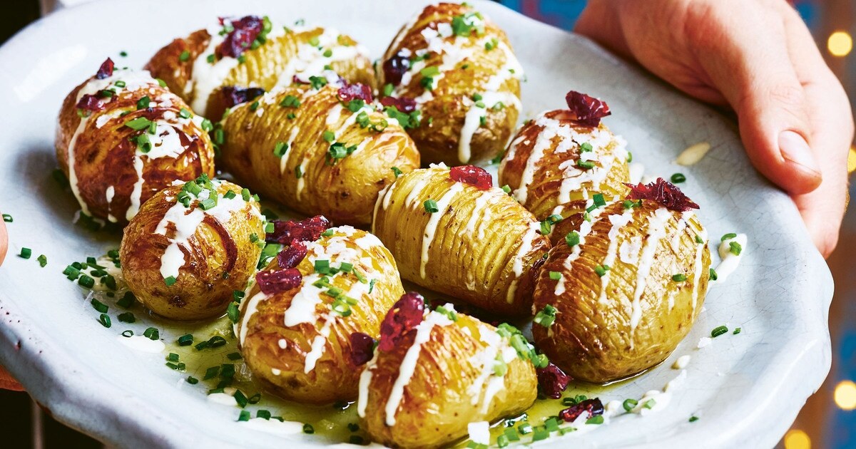 Hasselback Potatoes With Cashew Cheese Sauce | VegNews