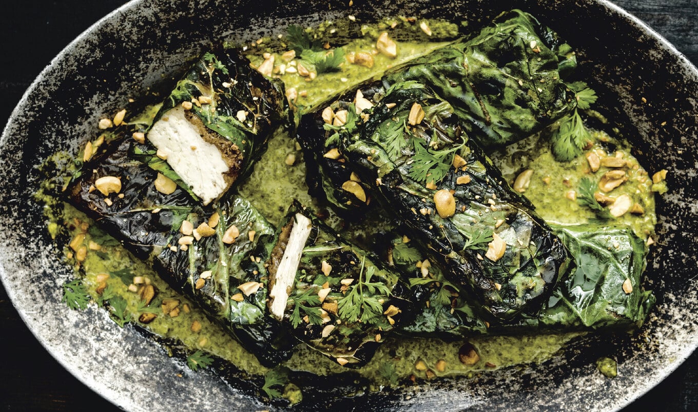 Jerk Tofu Wrapped in Collard Leaves With Crushed Peanuts