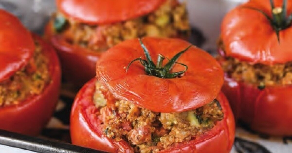 Pesto-Stuffed Tomatoes With Seasonal Vegetables | VegNews