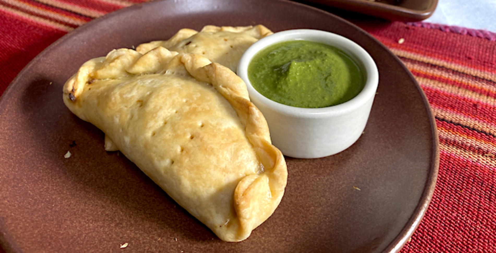 Plant-Based Beef Empanadas With Spicy Aji Verde