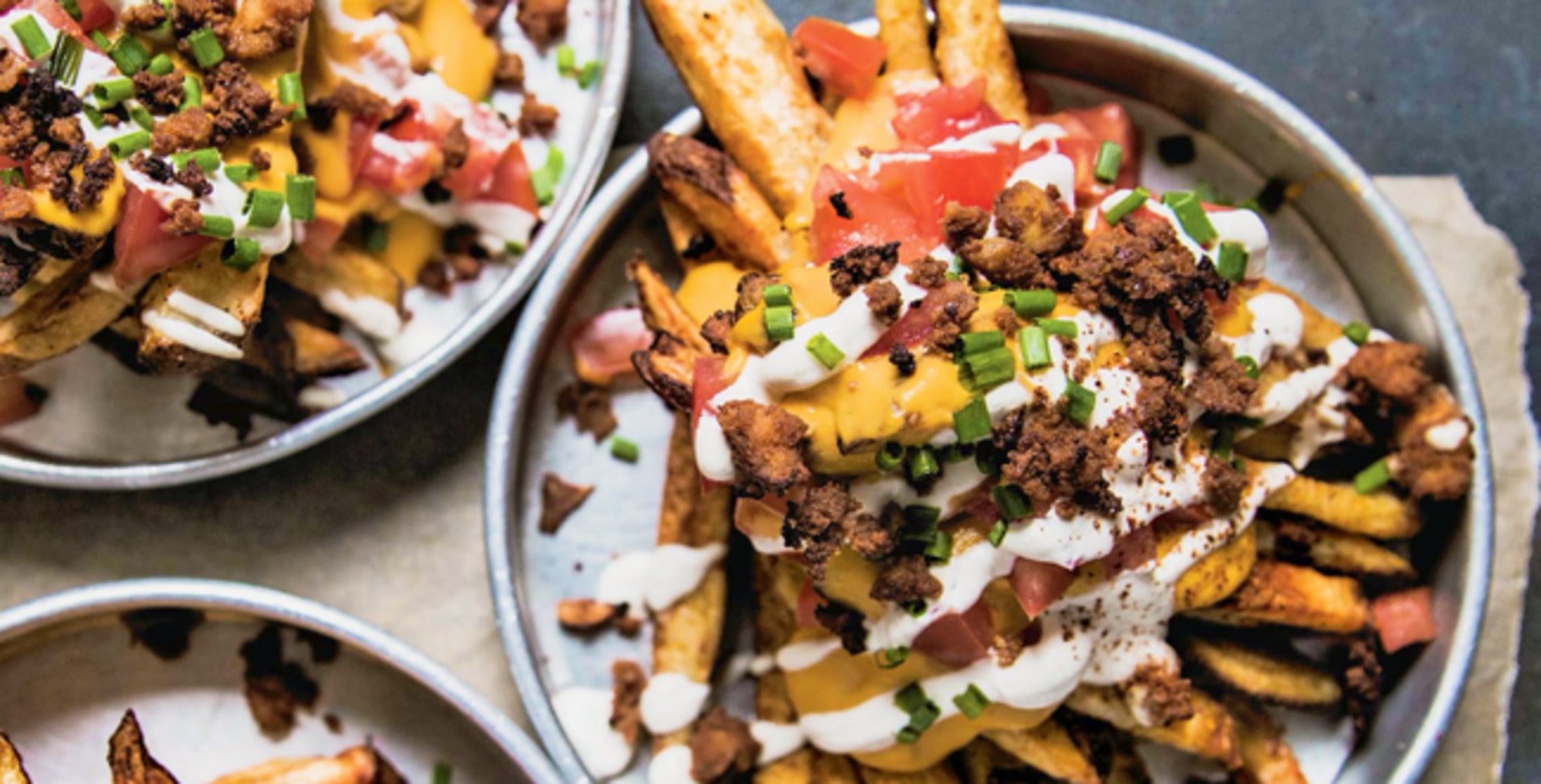 Supreme Vegan Nacho Fries With Tofu Bacon Crumbles