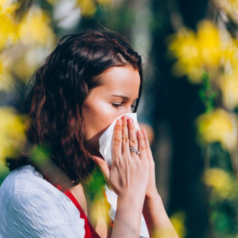 VegNews.WomanSneezing2