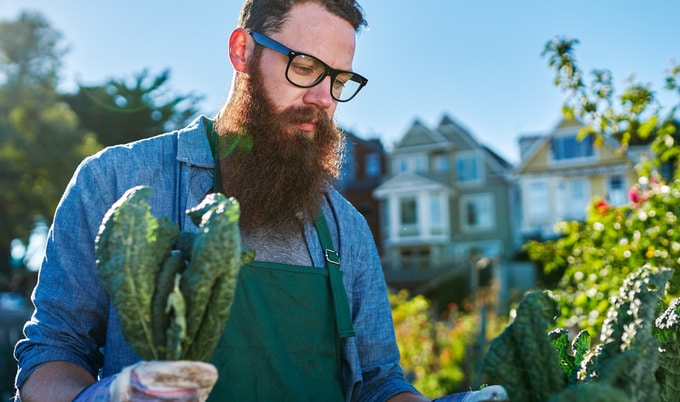 VegNews.ManInspectingKale