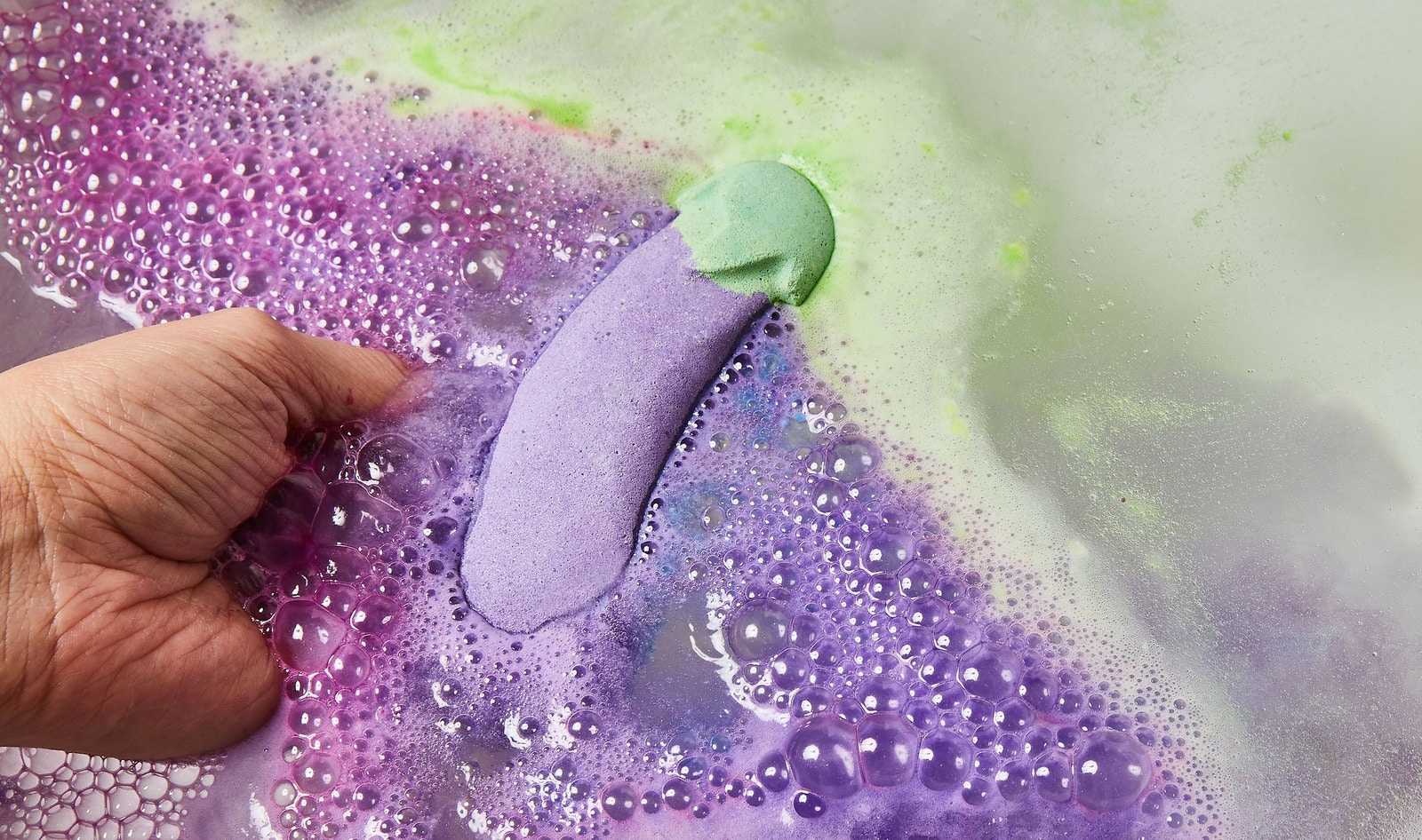LUSH Debuts Naughty Vegan Eggplant Emoji Bath Bomb for Valentine’s Day