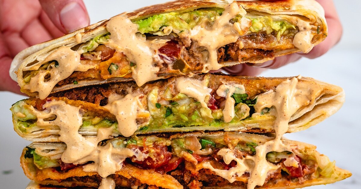 Copycat Crunchwrap Supreme With Gooey Cashew Queso | VegNews