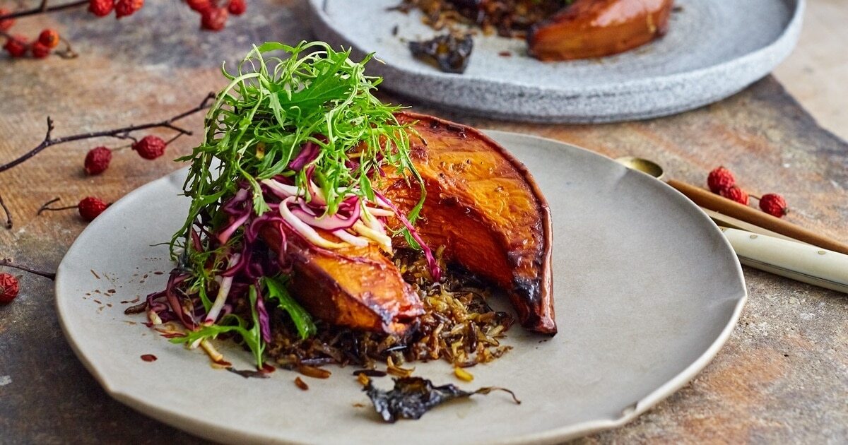 Roasted Sweet Basil Squash With Wild Rice and Mustard Greens Salad | VegNews