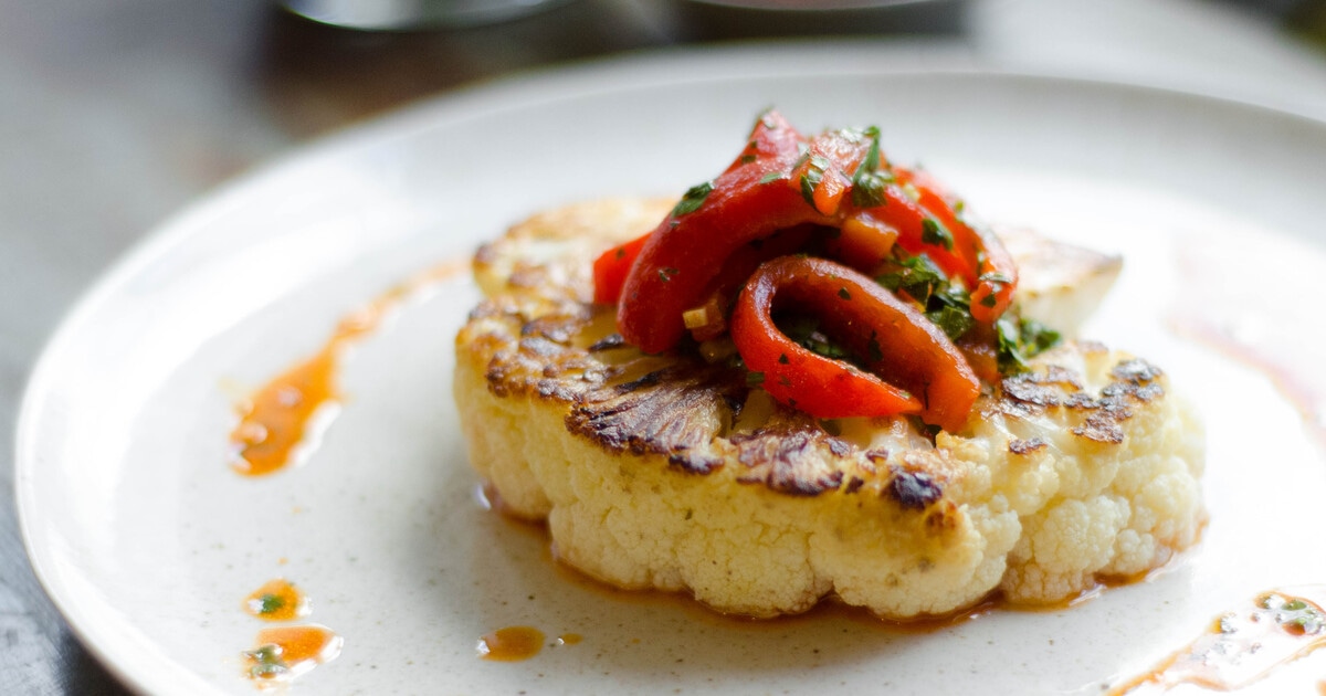 Cauliflower Steaks With Chimichurri Sauce | VegNews