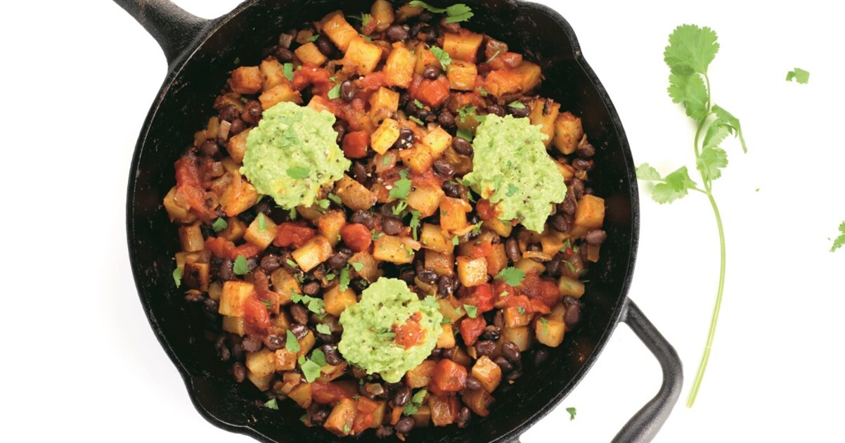Speedy Breakfast Hash With Potatoes, Black Beans, and Mashed Avocado | VegNews