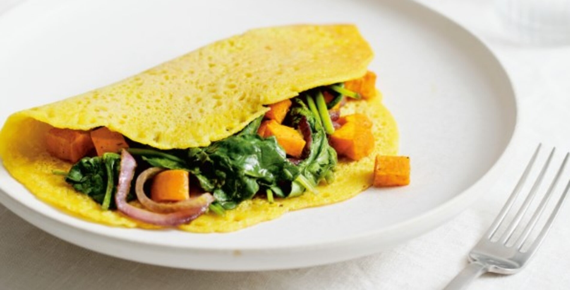 Chickpea Omelet With Curried Sweet Potato and Spinach