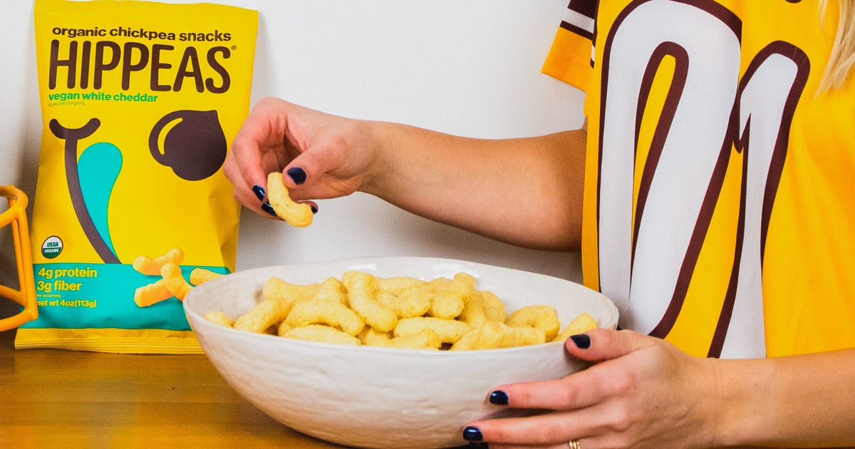 27 Super Cheesy Vegan Snacks, From Chips to Puffs | VegNews