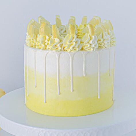 Vegan Lemon Cake With Buttercream Frosting And Lemon Curd