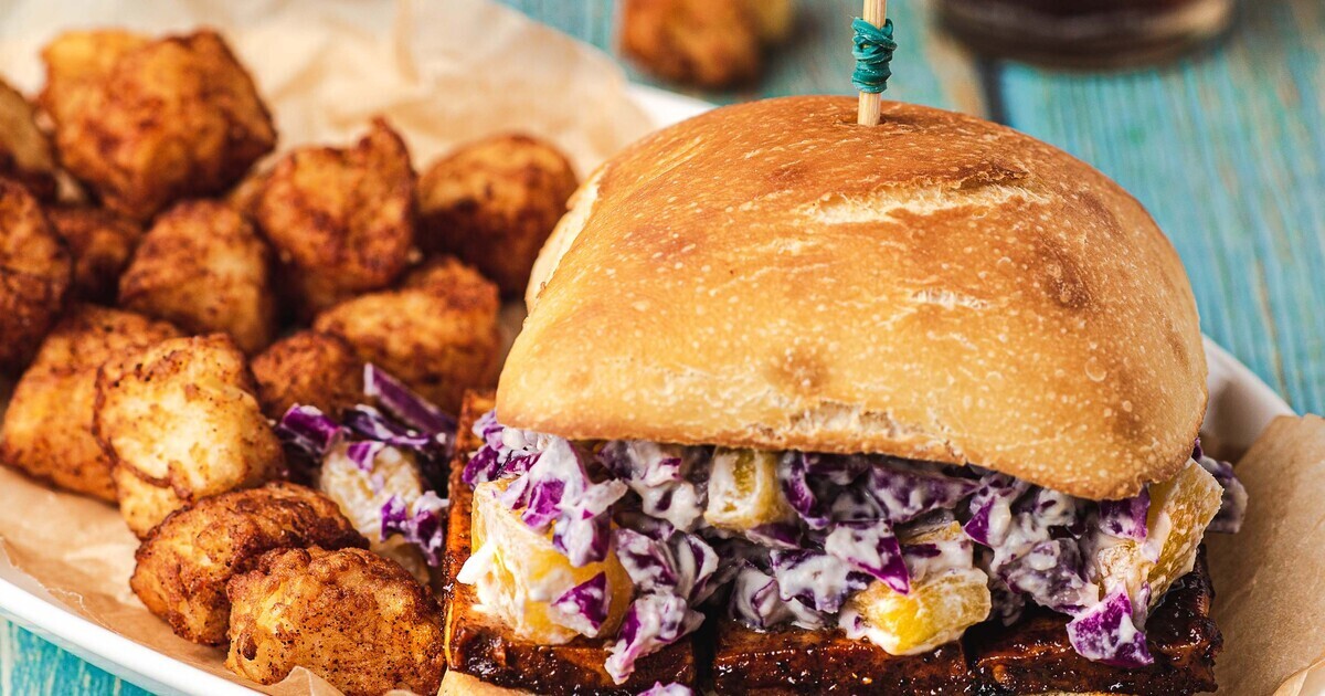 Marinated Tofu Sandwich With Pineapple Slaw | VegNews