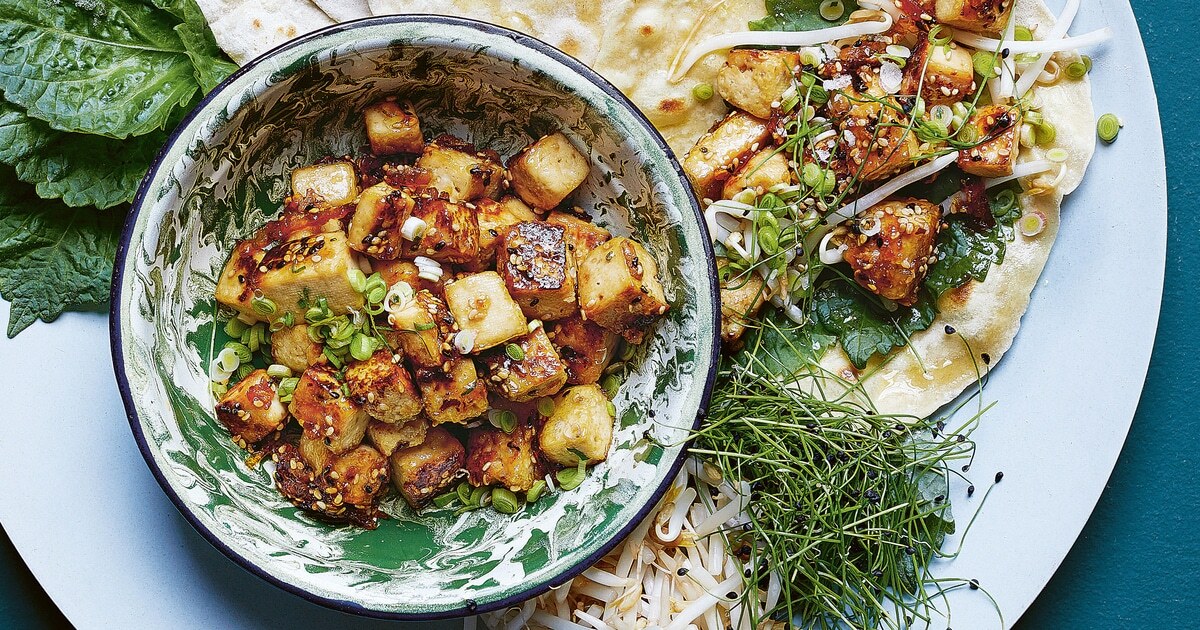 Sticky Sesame-Orange Tofu With Savory Pancakes | VegNews