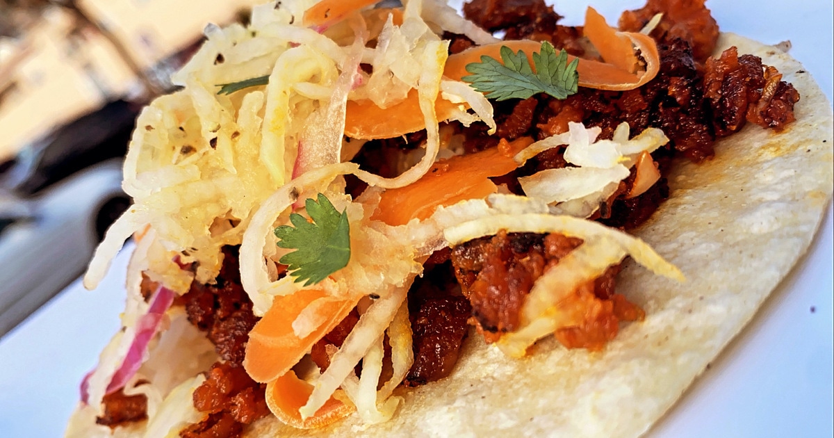 Vegan Grilled Mushroom and Tofu Sisig Tacos | VegNews