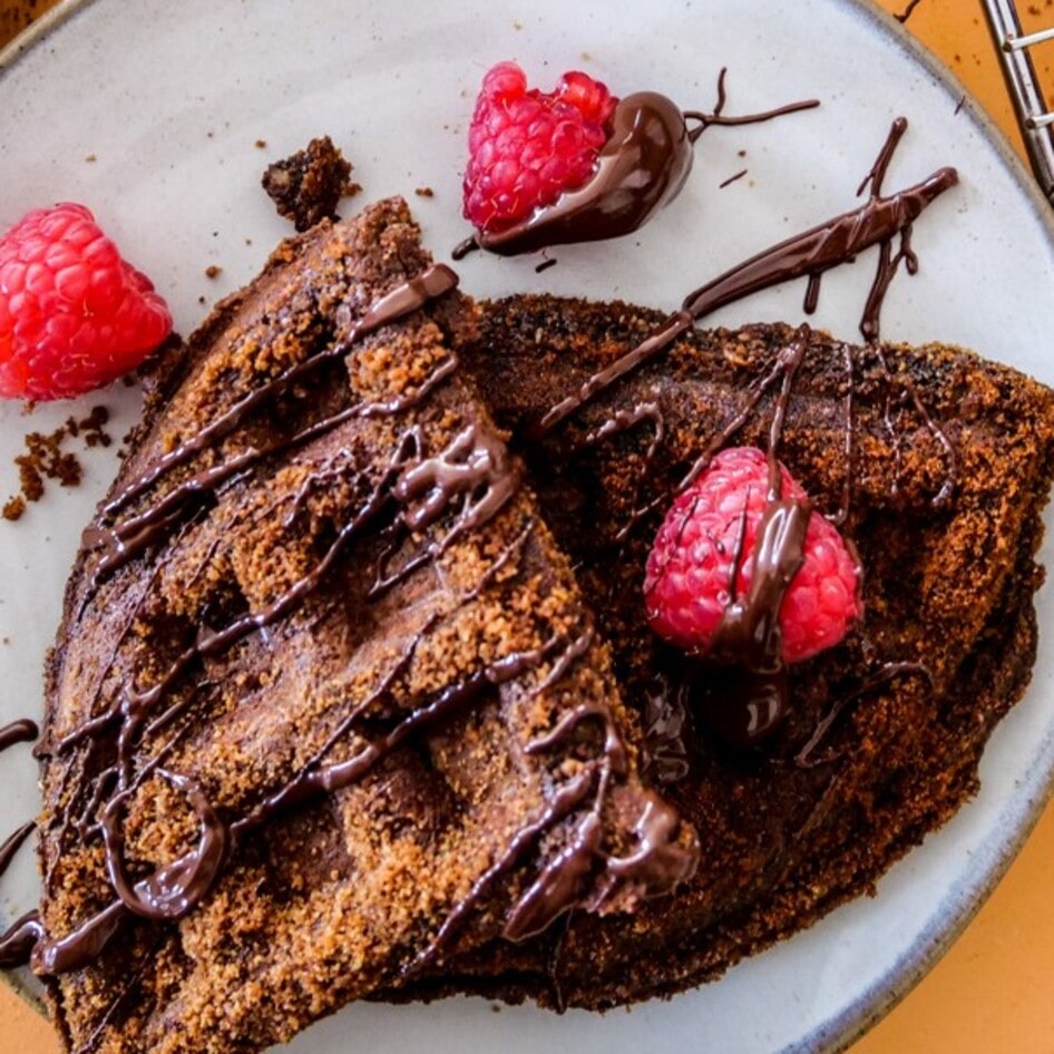 Vegan and Gluten-Free Chocolate Churro Waffles With Strawberry Sauce