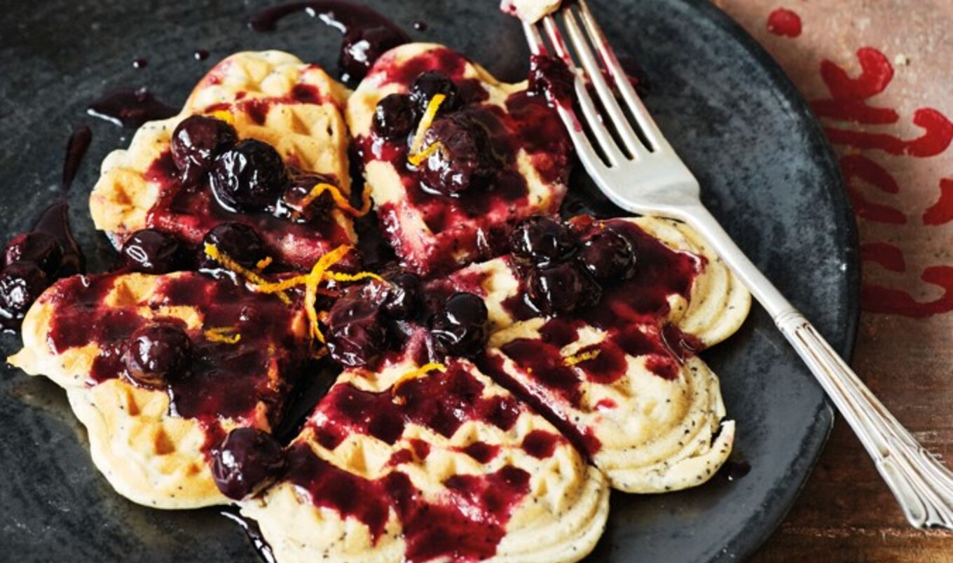 Vegan Poppy Seed Waffles With Blueberries, Orange Zest, and Maple Syrup