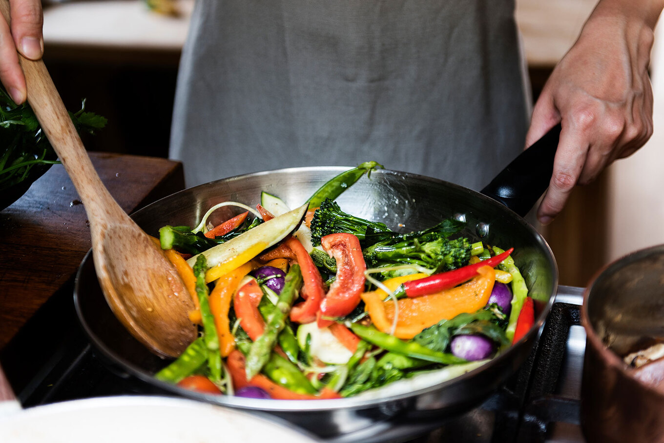 VegNews.CookingVegetables.AdobeStock