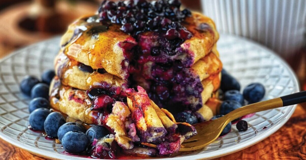 Vegan Blueberry Vanilla Pancakes With Maple Syrup | VegNews