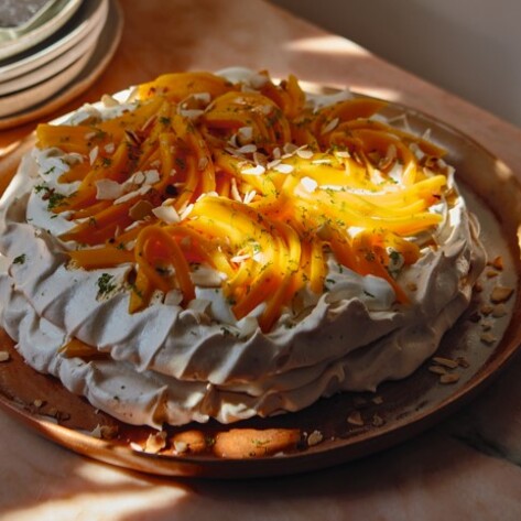 Vegan Black Pepper Pavlova With Fresh Mango and Vanilla Cream