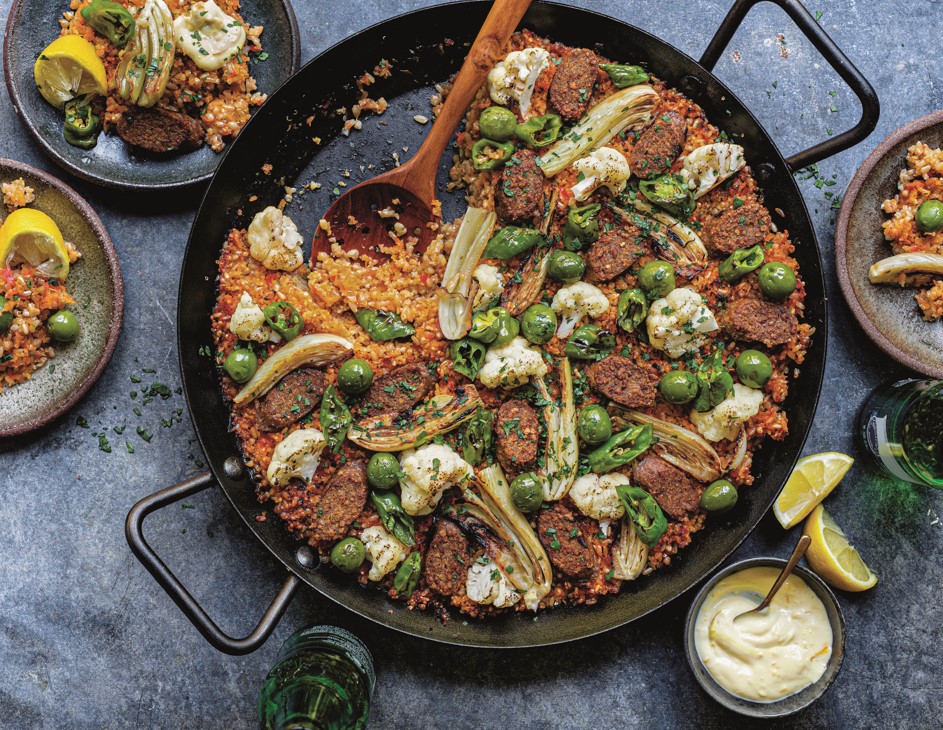 https://vegnews.com/media/W1siZiIsIjM4NDkwL1ZlZ05ld3MuUGFlbGxhLmpwZyJdLFsicCIsIm9wdGltaXplIl1d/VegNews.Paella.jpg?sha=102b5381efa1839d