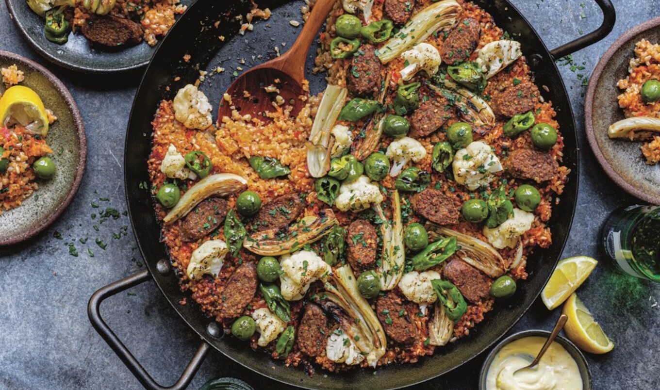 Vegetarian paella of blended grains with sausage and Castelvetrano olives