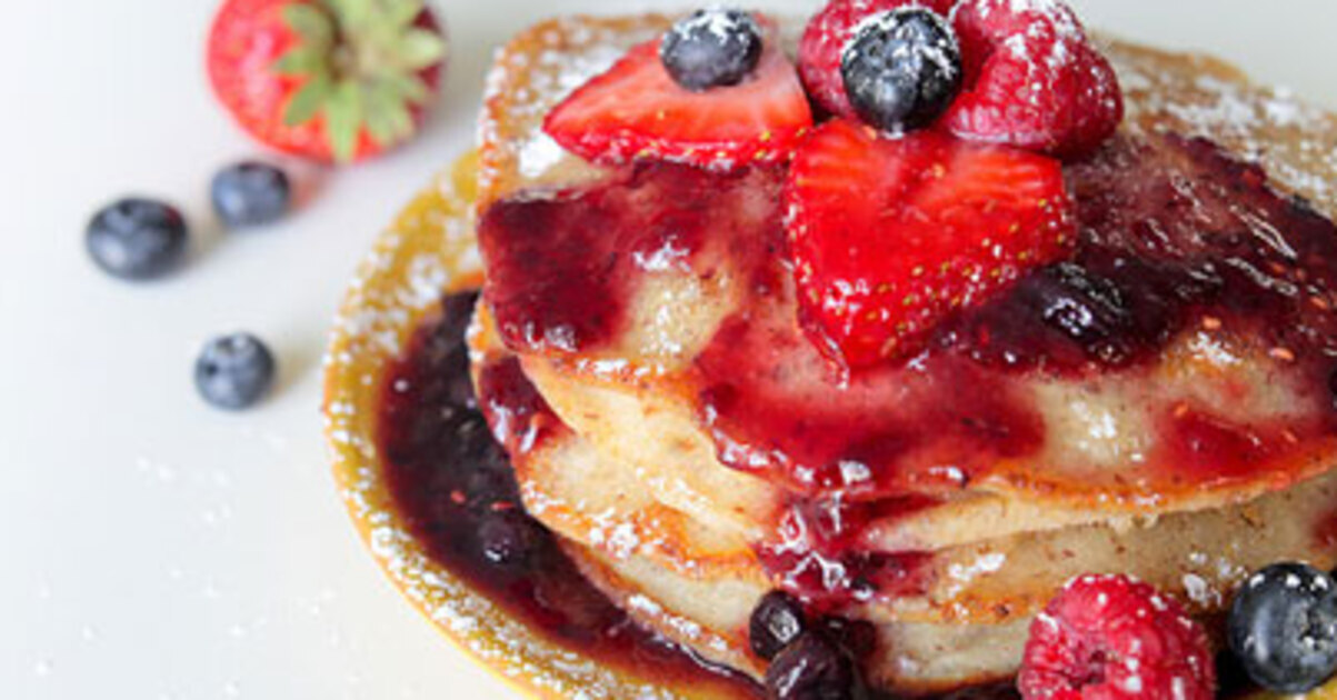 Spiced Banana Pancakes With Blueberry Syrup | VegNews