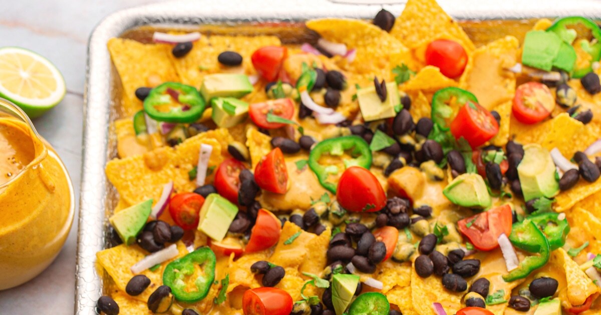 Loaded Cheesy Sheet-Pan Vegan Nachos | VegNews