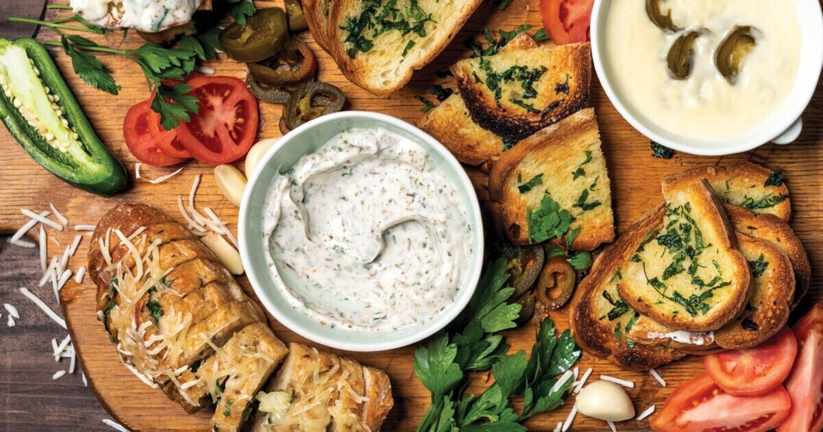 Vegan Garlic Bread Dippers With Jalapeño Cheddar and Creamy Garlic Dipping Sauces  | VegNews