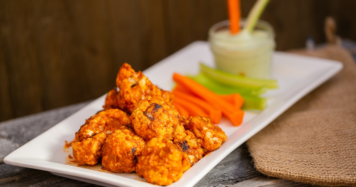 Spicy Cauliflower Wings With Pesto Dipping Sauce | VegNews
