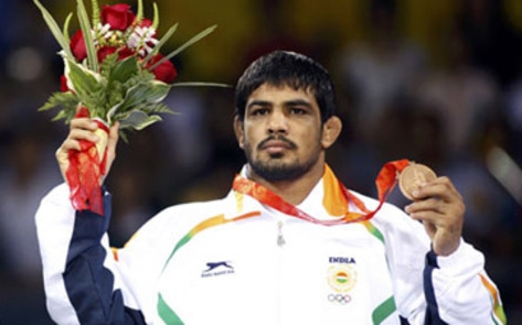 Bronze Medalist Poses for PETA