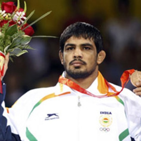 Bronze Medalist Poses for PETA