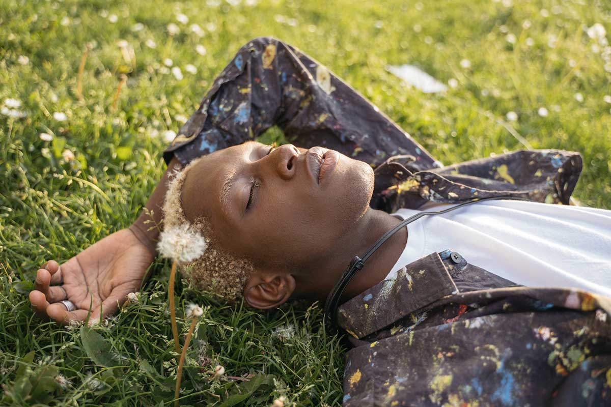 Person Relaxing in Grass