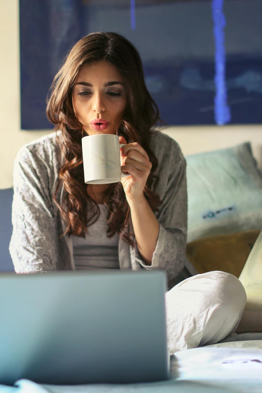 sitting in bed with coffee