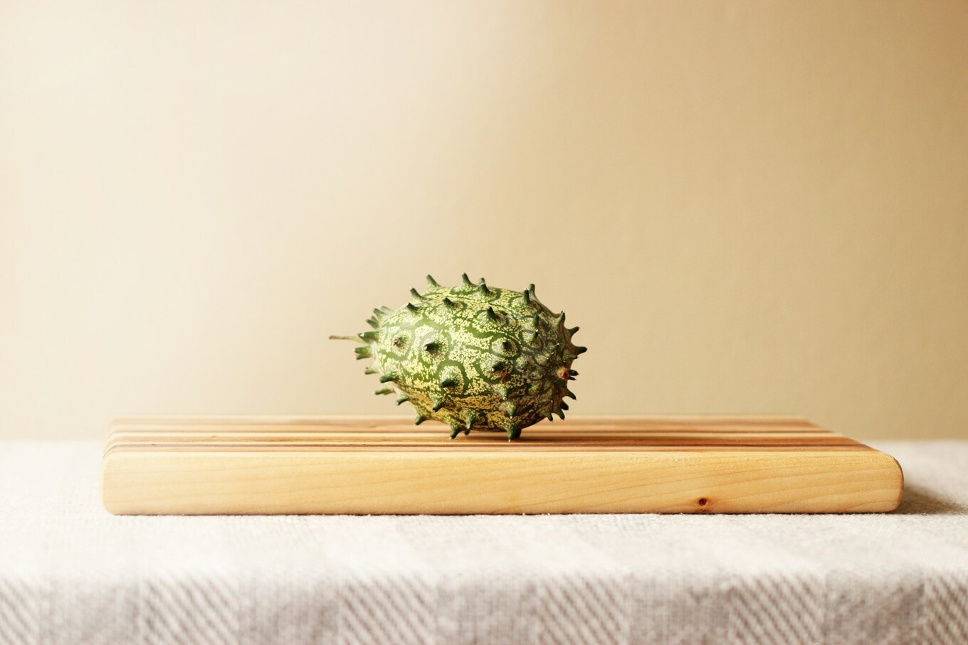 kiwano melon on chopping board