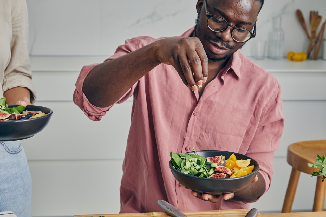man making food