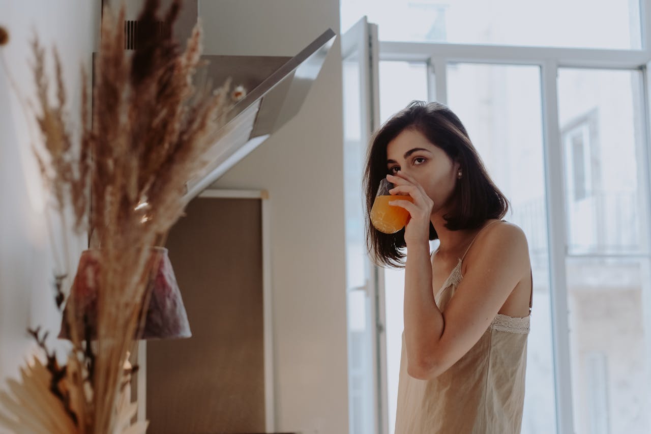 woman drinking juice