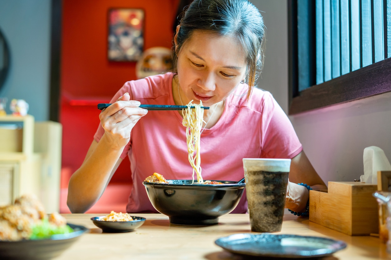 woman eating ramen
