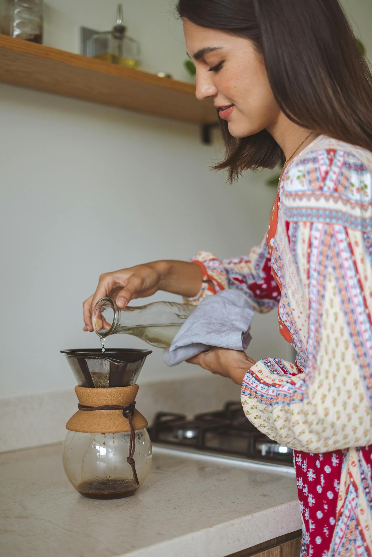 pexels-cristian-rojas-pouring-coffee