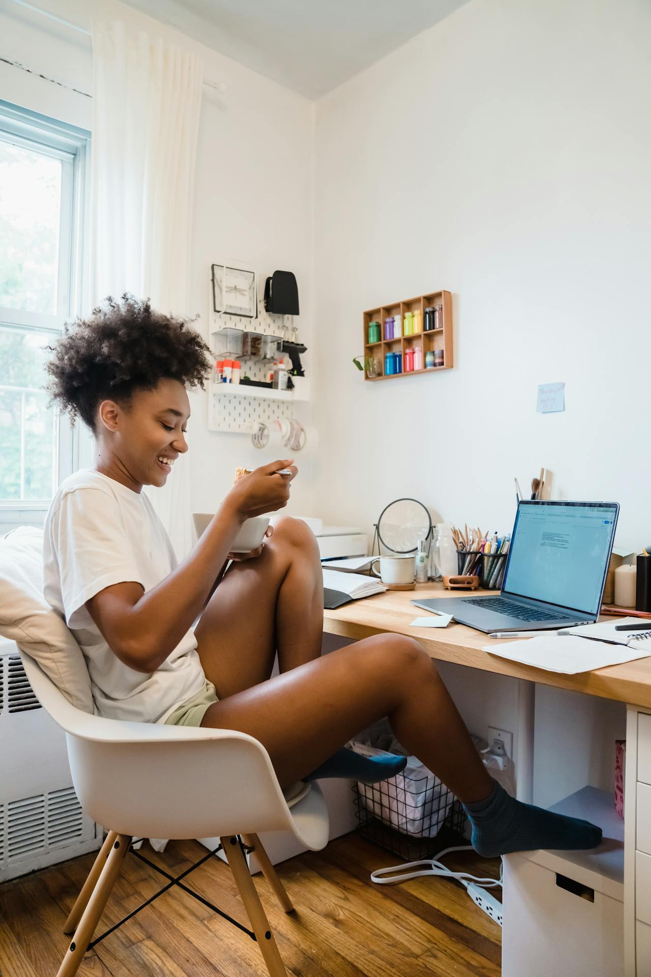 woman eating at desk