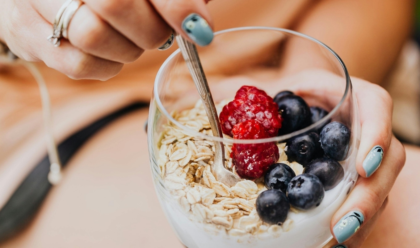 yogurt berries and seeds with spoon