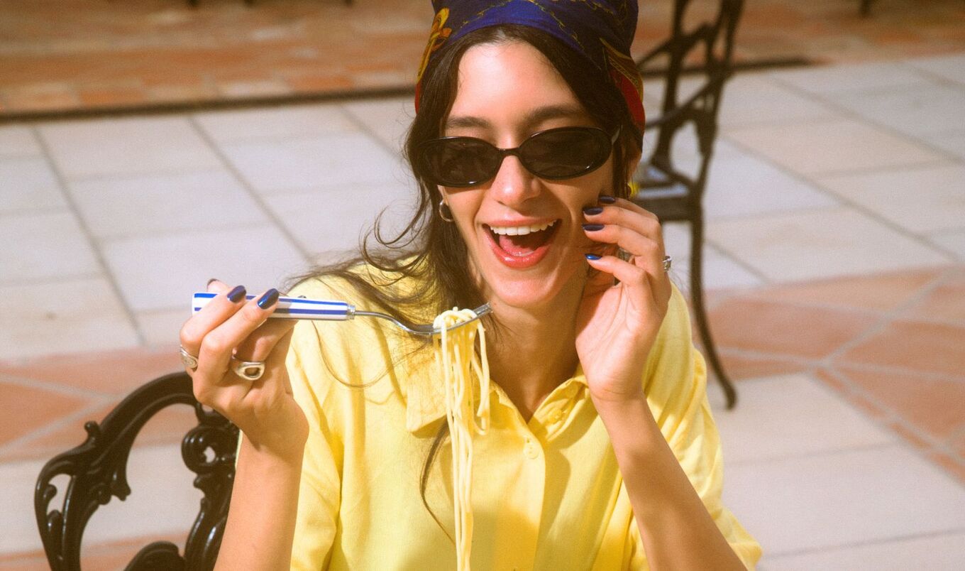woman eating pasta