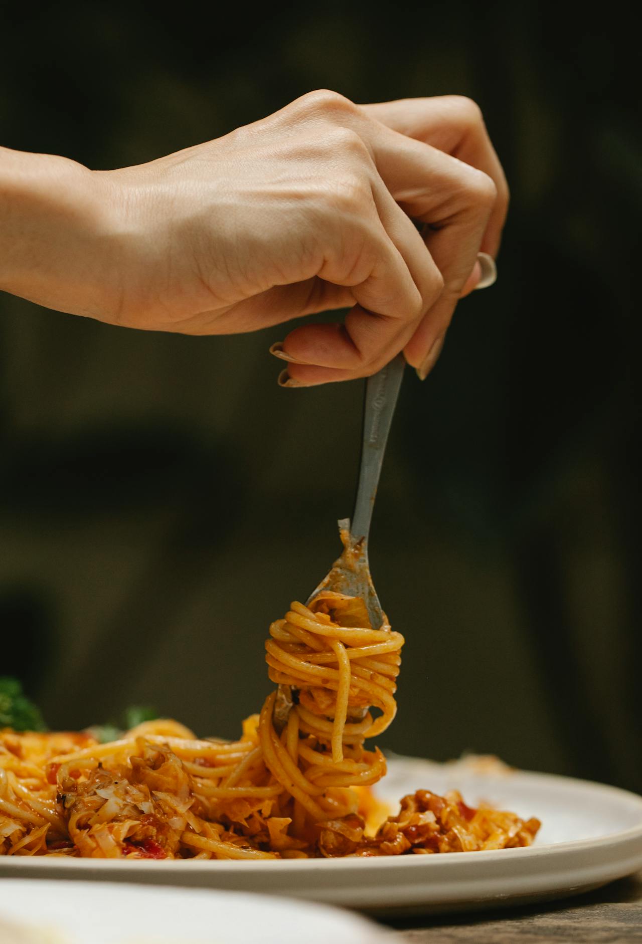 twisting spaghetti with fork
