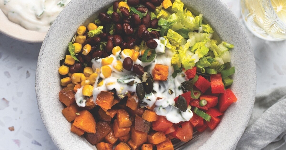 Black Bean Sweet Potato Bowl With Creamy Yogurt Dressing | VegNews