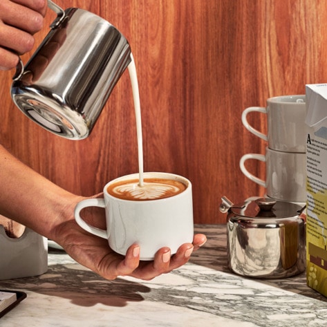 15 Dairy-Free Coffee Creamers Worth a Second Cup